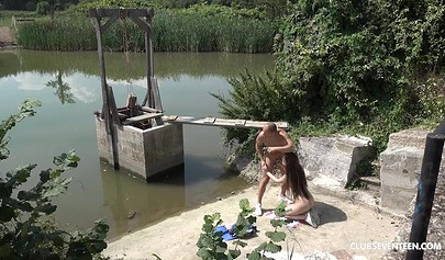 Slim brunette teen in jean shorts gets fucked outdoors by a big bald guy