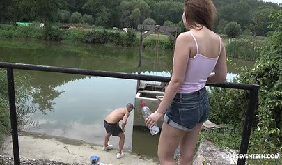 Slim brunette teen in jean shorts gets fucked outdoors by a big bald guy
