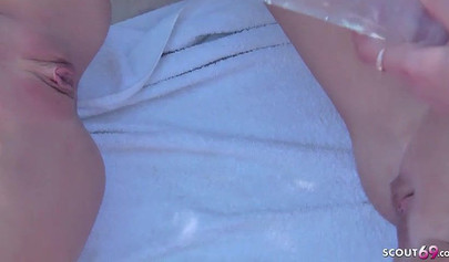 German teen babes have fun without men in a massive lesbian orgy at the beach