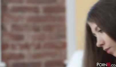 Teen with flat chest plays with herself in the kitchen and loves to be watched