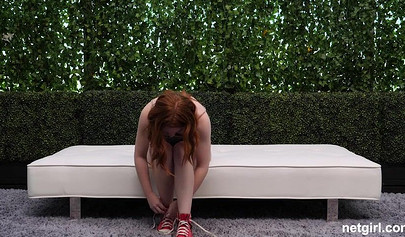 Two redhead nubiles lick and finger each other and get fucked hard in a threesome