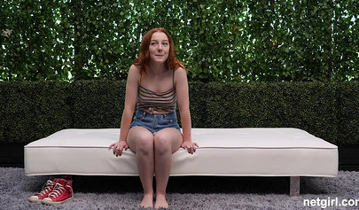 Two redhead nubiles lick and finger each other and get fucked hard in a threesome