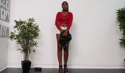 Busty ebony nubile swallows a huge white cock and gets her pussy pounded rough