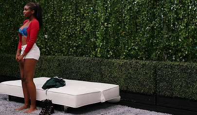 Busty ebony nubile swallows a huge white cock and gets her pussy pounded rough