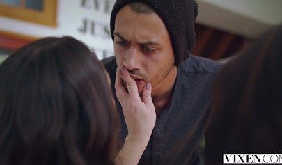 Two ravishing young teenies taking turns slobbering on a hard cock and riding it