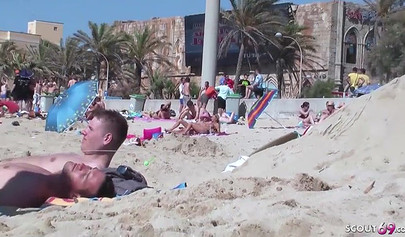 Lesbian teen couple has sex on the beach while the public is watching carefully