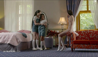 Three gorgeous slim lesbians strip naked and rub and kiss each other to orgasm