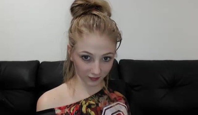 Slim blonde teen strips naked to rub herself and suck a hard cock on a webcam