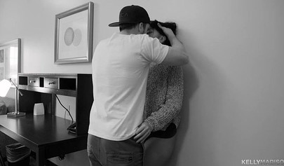 Ravishing black-haired teenie sucks a massive cock before having her ass railed