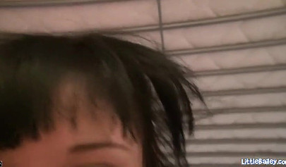 Skinny brunette teens gets on her knees and sucks a big fat cock and chokes