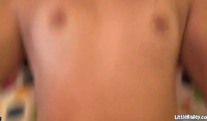 Skinny brunette teens gets on her knees and sucks a big fat cock and chokes