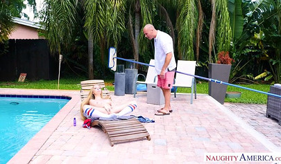 Busty blonde teen chokes on his hard cock and takes it balls deep by the pool