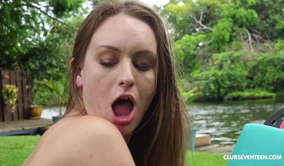 Playful brunette teen deepthroats a big hard cock before being pounded outside