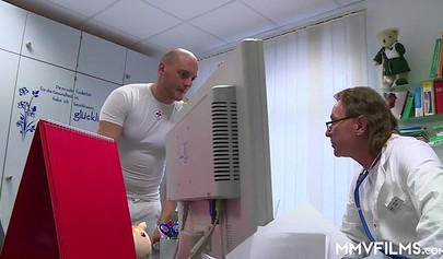 Blonde teenage girl sucks two cocks and gets double penetrated in a doctors office