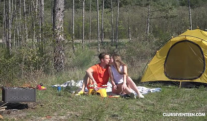Horny young nubile swallows his cock and rides him hard outside while camping