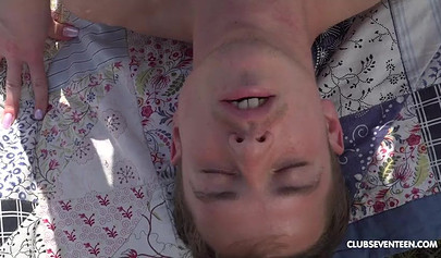 Horny young nubile swallows his cock and rides him hard outside while camping