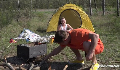 Horny young nubile swallows his cock and rides him hard outside while camping