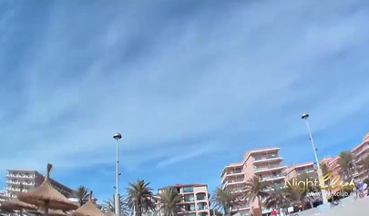 Two German teens have some fun at the beach with a guy and a black strap-on