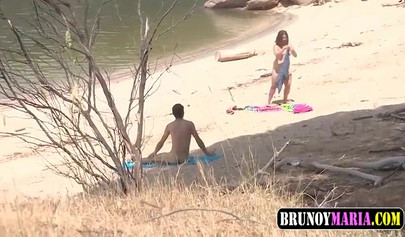 Hot teen girl fucks a voyeur on the public beach and gets it all on recording