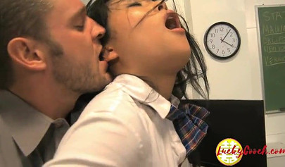 Asian teen student chokes on teacher's dick and then gets fucked on the table