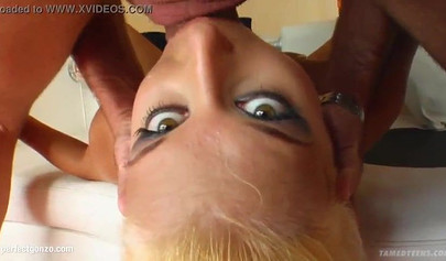 Hot teenage girl sucks two big dicks and then gets nicely double penetrated