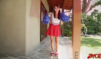 Teenage cheerleader gets her tight cunt creamed while she is still in uniform