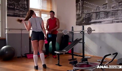 Fit and hot teenage whore gets her asshole drilled in a gym by her own trainer
