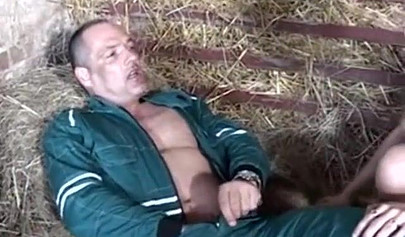 Redhead German girls fucks and sucks two large dicks inside a village barn