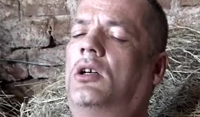 Redhead German girls fucks and sucks two large dicks inside a village barn