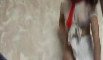 Beautiful schoolgirl teenage brunette in a solo video with a big pink dildo