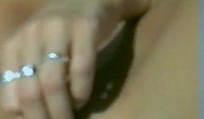 A perverted guy secretly records a naked busty teen girl on a beach for himself