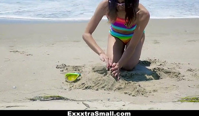 Small cute Asian teenage girl fucked on the beach in her cute rainbow swimsuit