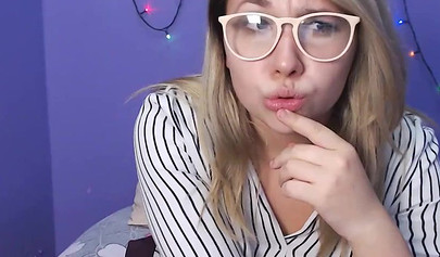 Cute young nubile Milly Ice fingers herself and fondles her tits on a web cam