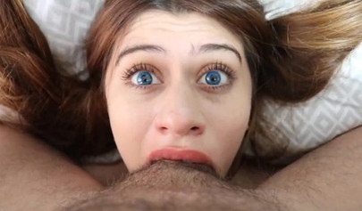 Beautiful redhead nubile chokes on a huge cock shoved deep down her horny throat