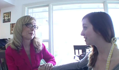 Adorable brunette teen seduced by a hot MILF Nina Hartley into licking each other