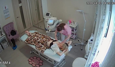 Skinny blonde teen recorded with a hidden cam in a salon doing her depilation