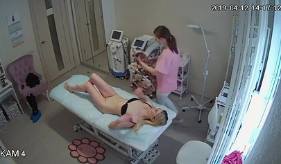 Skinny blonde teen recorded with a hidden cam in a salon doing her depilation