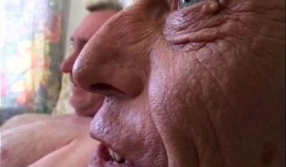 Amateur black-haired nubile spit roasted by two horny older guys with hard cocks