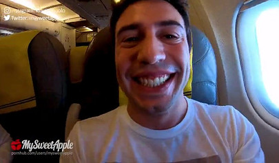 Brunette teenage girl makes a risky move by sucking a huge dick on an airplane