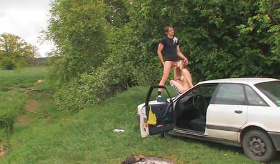 Hot teenage couple have sexual intercourse in public on top of an old timer car