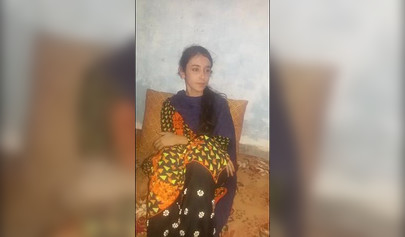 Busty muslim teen shows her big titties and play with them on a low quality cam