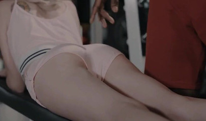 Blonde teen gets fucked in her little asshole in the middle of a gym session