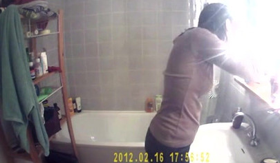 Busty and chubby teenage girl poses in the bathroom and takes a long shower