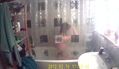 Busty and chubby teenage girl poses in the bathroom and takes a long shower