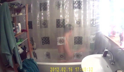 Busty and chubby teenage girl poses in the bathroom and takes a long shower