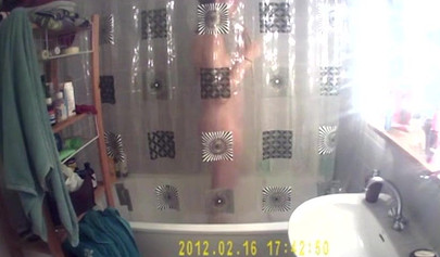 Busty and chubby teenage girl poses in the bathroom and takes a long shower