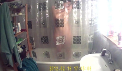 Busty and chubby teenage girl poses in the bathroom and takes a long shower