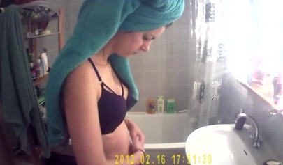 Busty and chubby teenage girl poses in the bathroom and takes a long shower