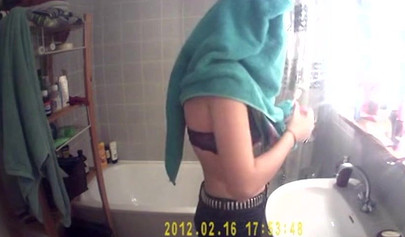 Busty and chubby teenage girl poses in the bathroom and takes a long shower