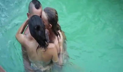 Two nasty looking teenage girls seduce a guy and share his dick in the pool